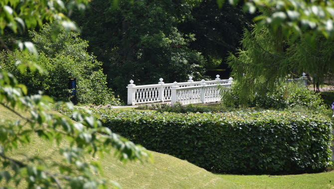 Bridge in a blossoming Nolhaga castle park