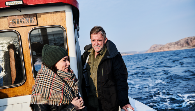 Woman and a man on a boat